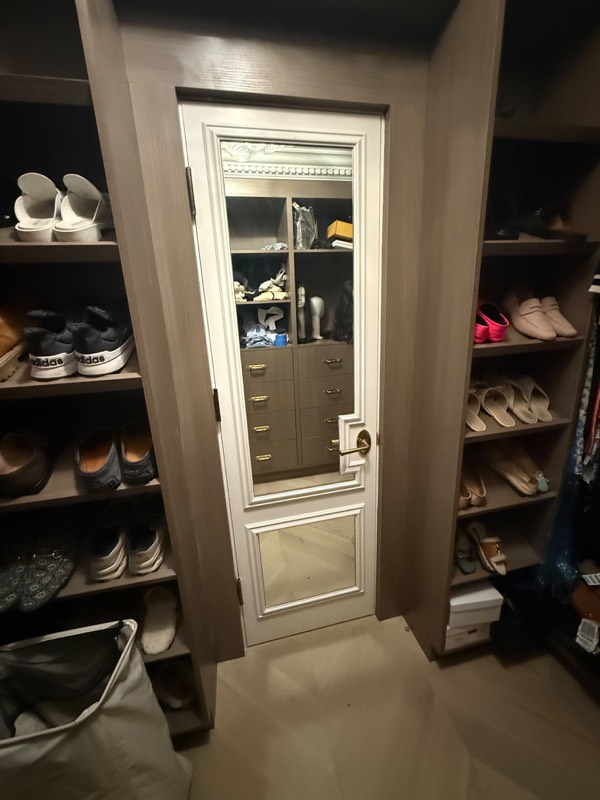 Closet door with two custom cut mirror panels