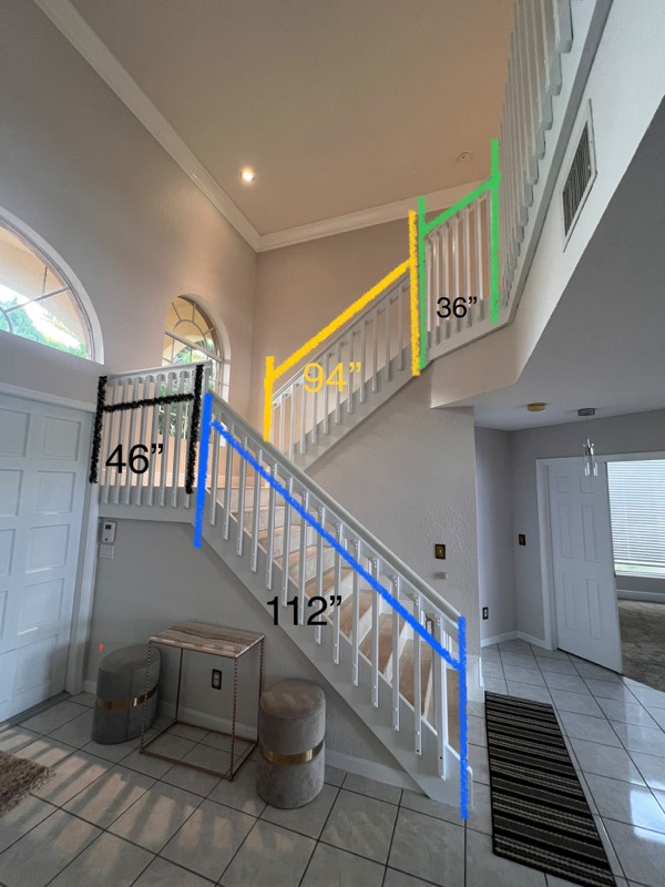 Staircase with white wood balusters and measurements before the glass railing